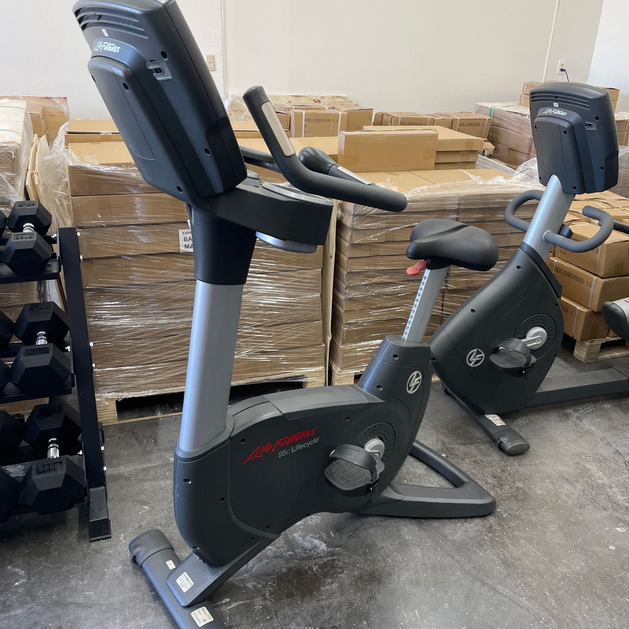 Back right view of the Life Fitness 95c Inspire Upright Bike in Warehouse