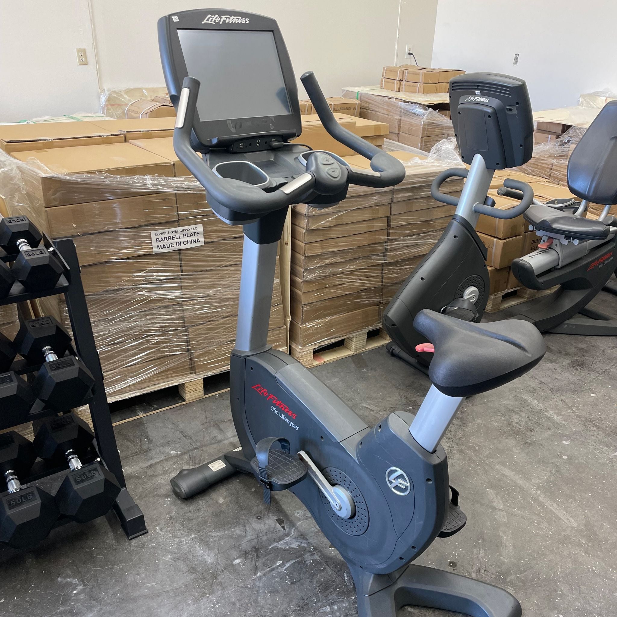 Front left view of the Life Fitness 95c Inspire Upright Bike in Warehouse