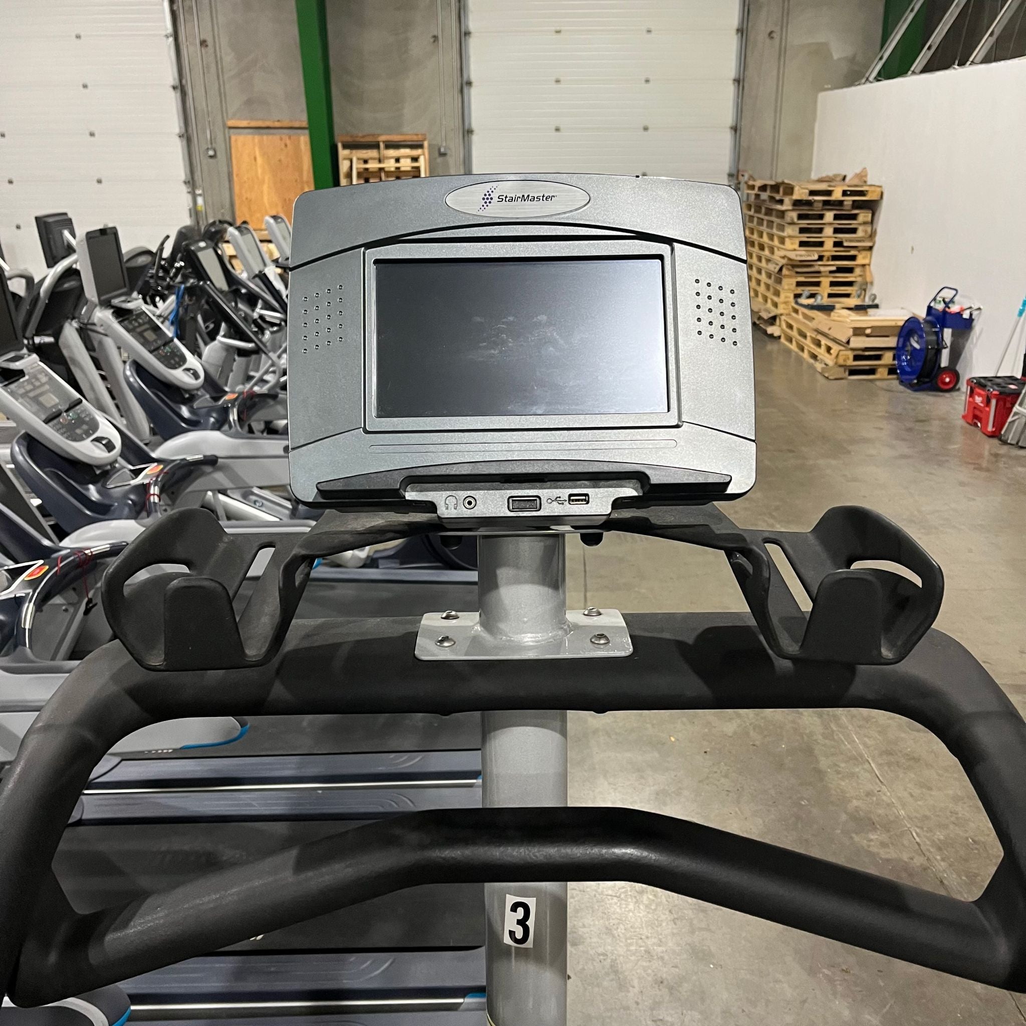 The touchscreen console on the StairMaster SM5 StepMill in Warehouse