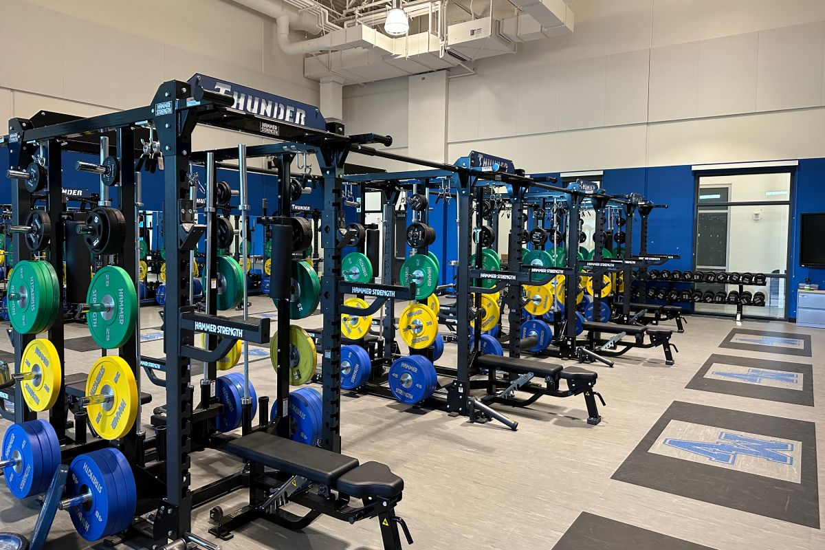 Top-of-the-line strength equipment at a school gym installed by Express Gym Supply