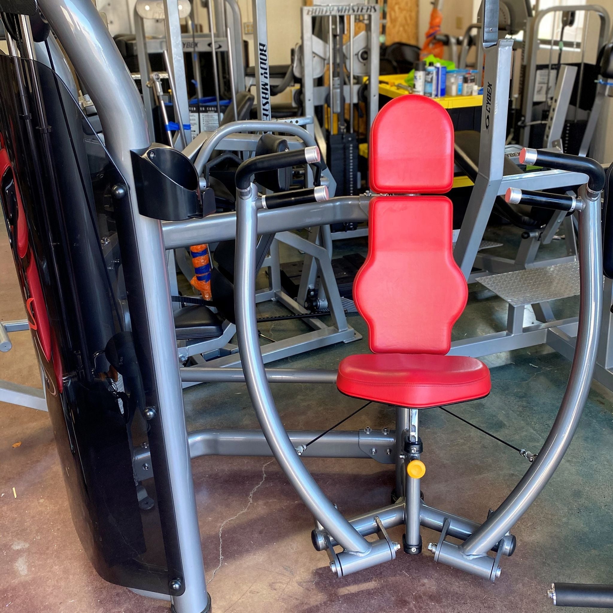 Matrix G3 Converging Chest Press in warehouse, Red