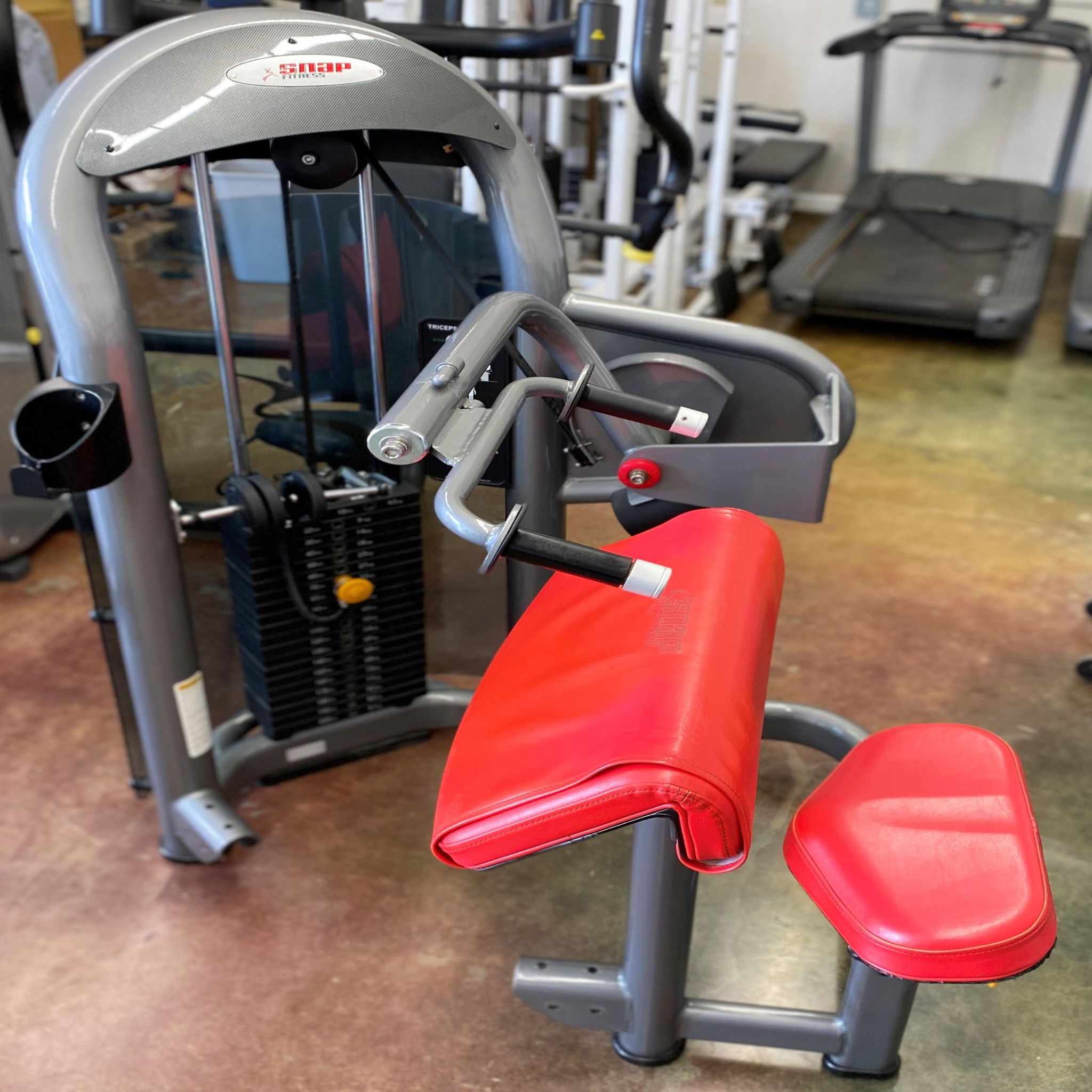 Front left-hand view of the Matrix G3 Tricep Extension in Warehouse, Red seating
