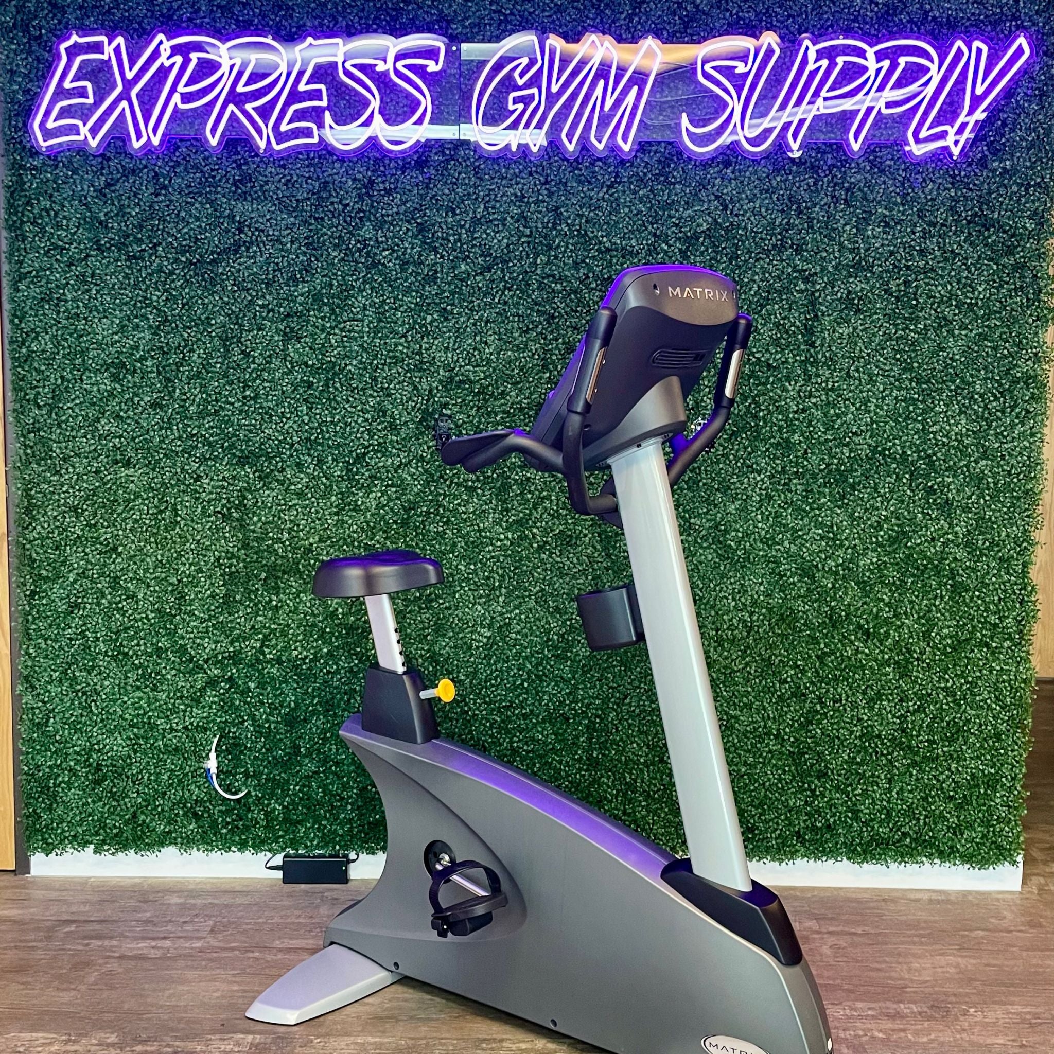 Back right view of the Matrix U7x Upright Exercise Bike in Warehouse