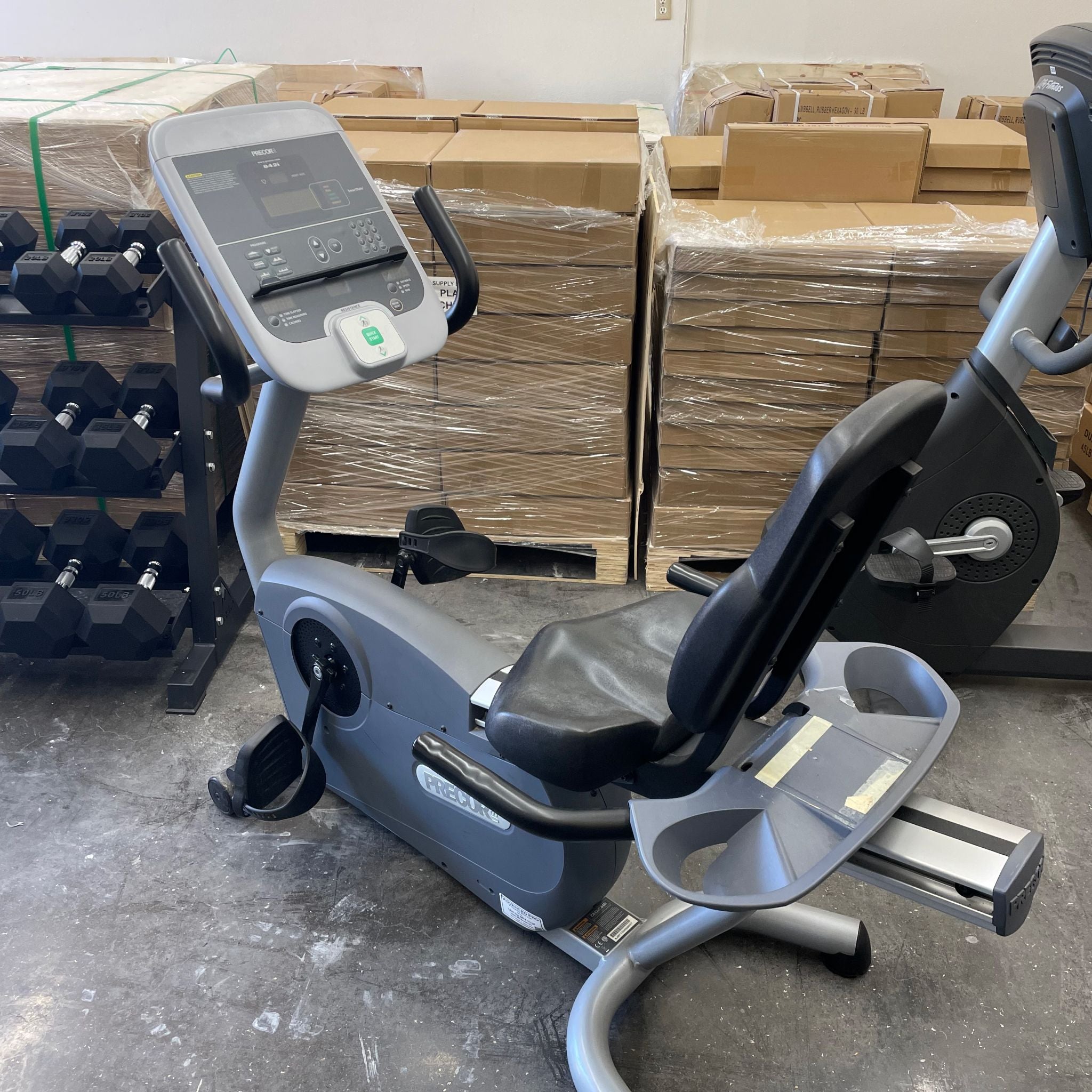 Back left view of the Precor c846i Recumbent Bike in Warehouse